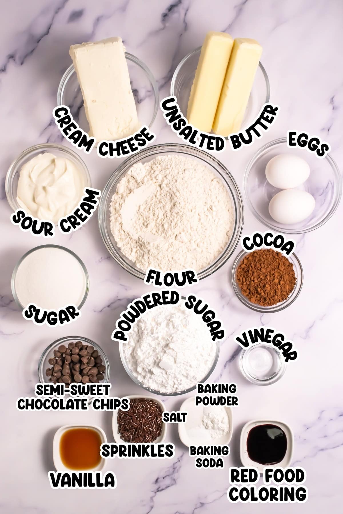 Baking ingredients including flour, eggs, butter, cream cheese, cocoa, and more.
