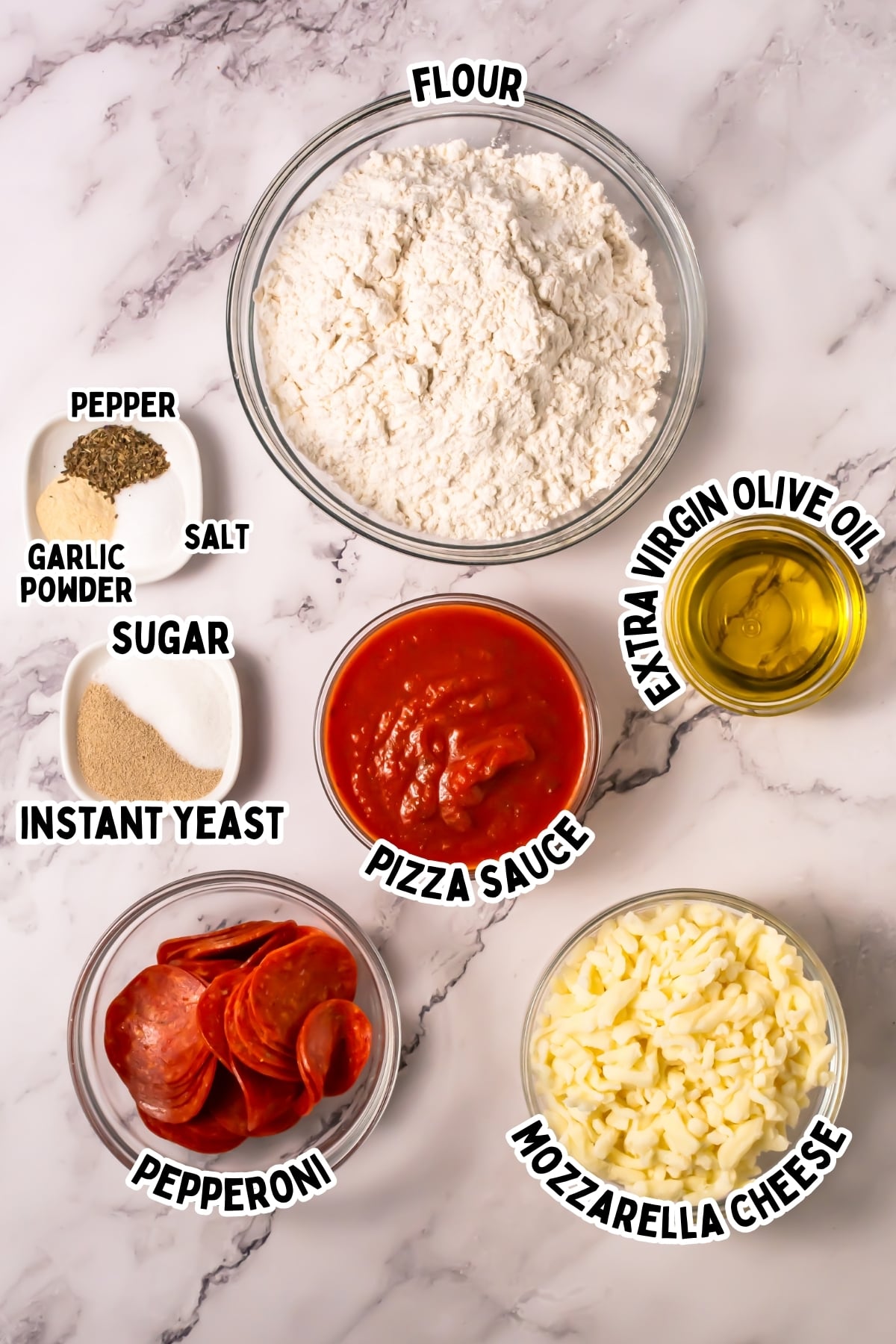 Pizza ingredients in bowls: flour, oil, sauce, cheese, pepperoni, yeast, and spices.