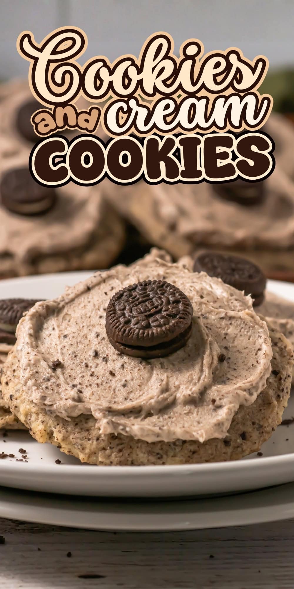 Cookies and cream cookies topped with cream and a mini chocolate sandwich cookie.