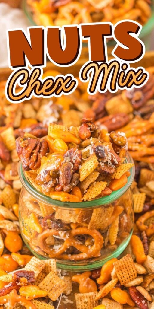 A jar filled with nuts and Chex mix, surrounded by more snack mix.