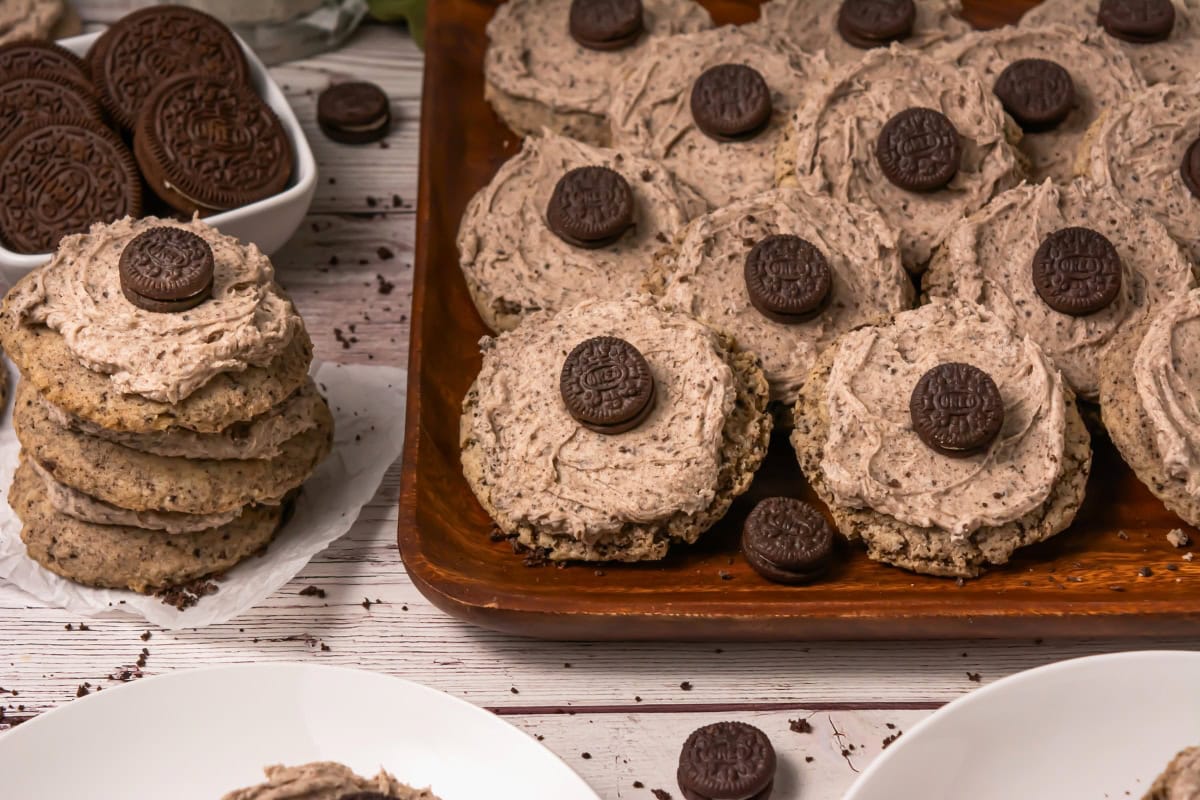 Cookies and cream cookies topped with mini chocolate sandwich cookies on a tray.