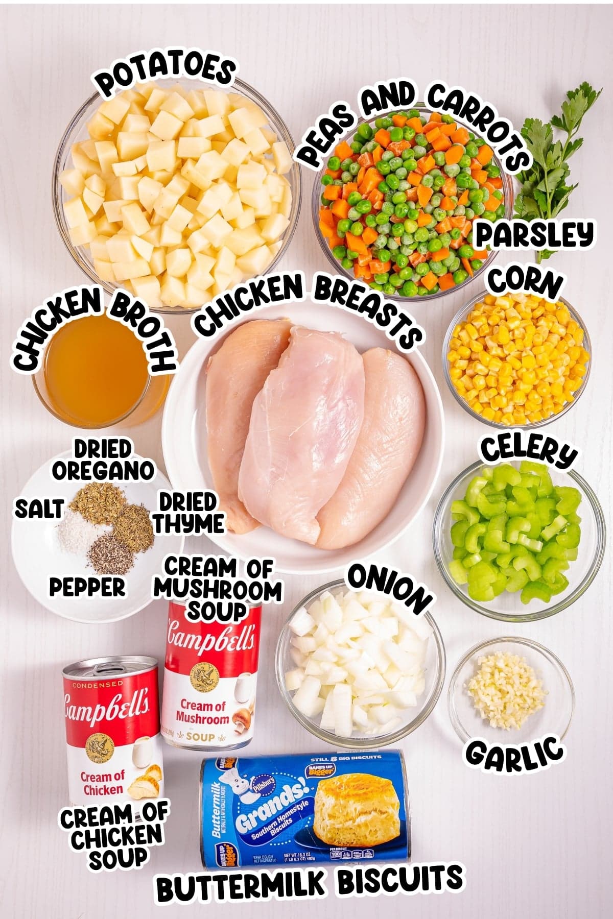 Ingredients for chicken pot pie laid out in bowls, labeled with their names.