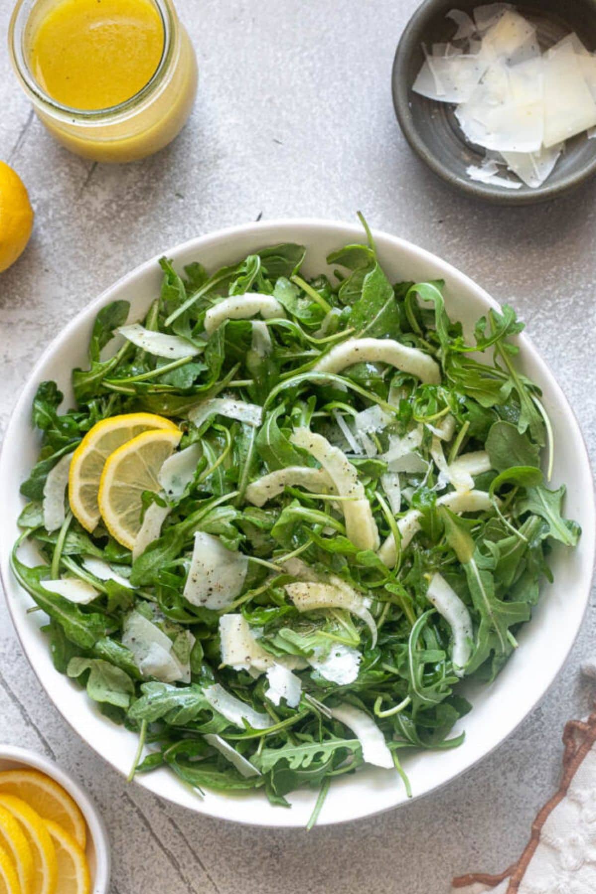 Bowl of arugula salad, perfect for fresh spring vegetable recipes.