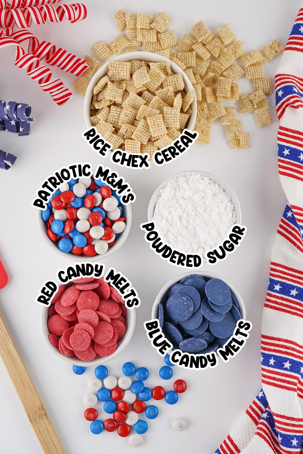 Bowls of Rice Chex, MMs, powdered sugar, red and blue candy melts.