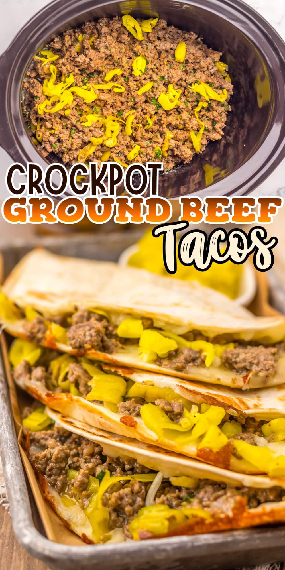 Ground beef tacos with yellow peppers on a tray and crockpot of beef in the background.