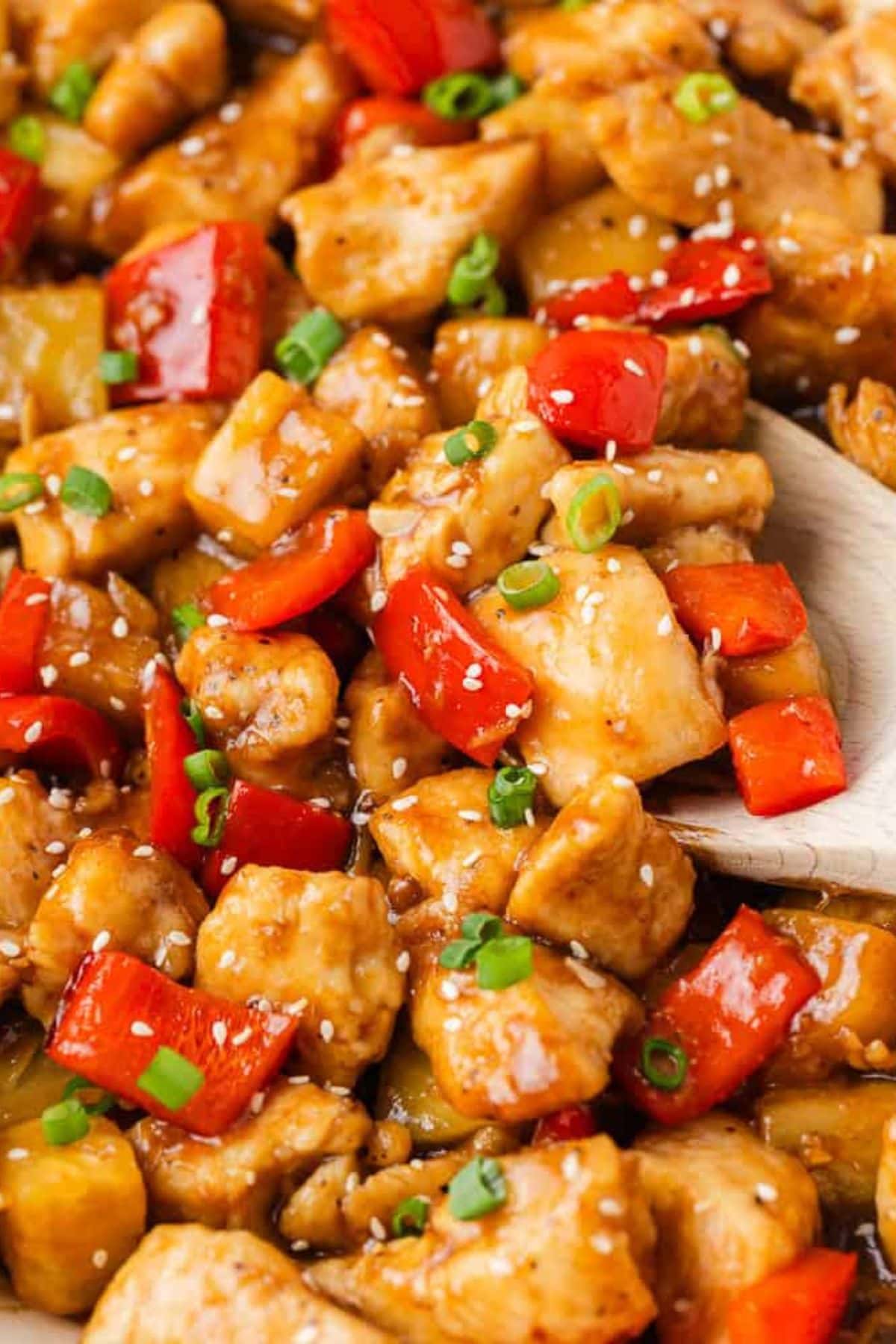 Stir-fried chicken with red bell peppers, sesame seeds, and pineapple recipes.