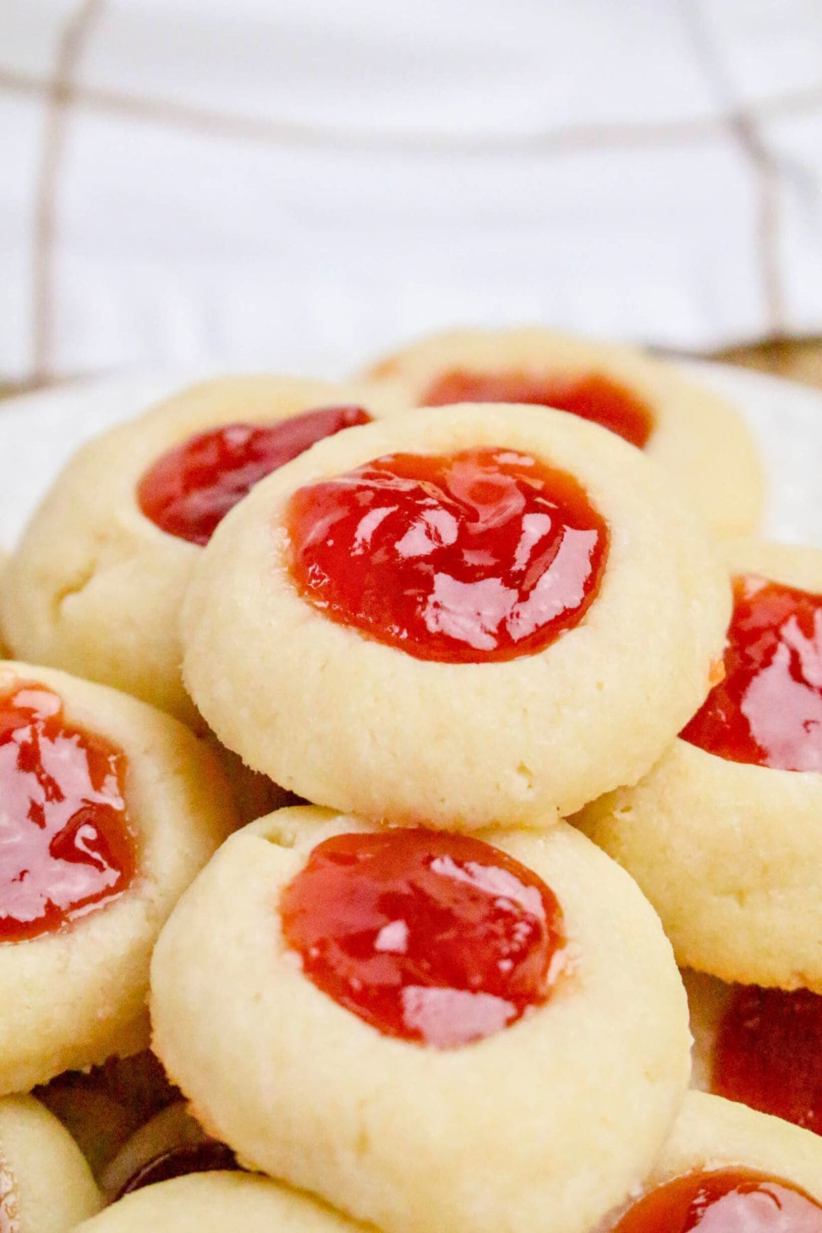 A close-up of thumbprint cookies, a classic in raspberry recipes.