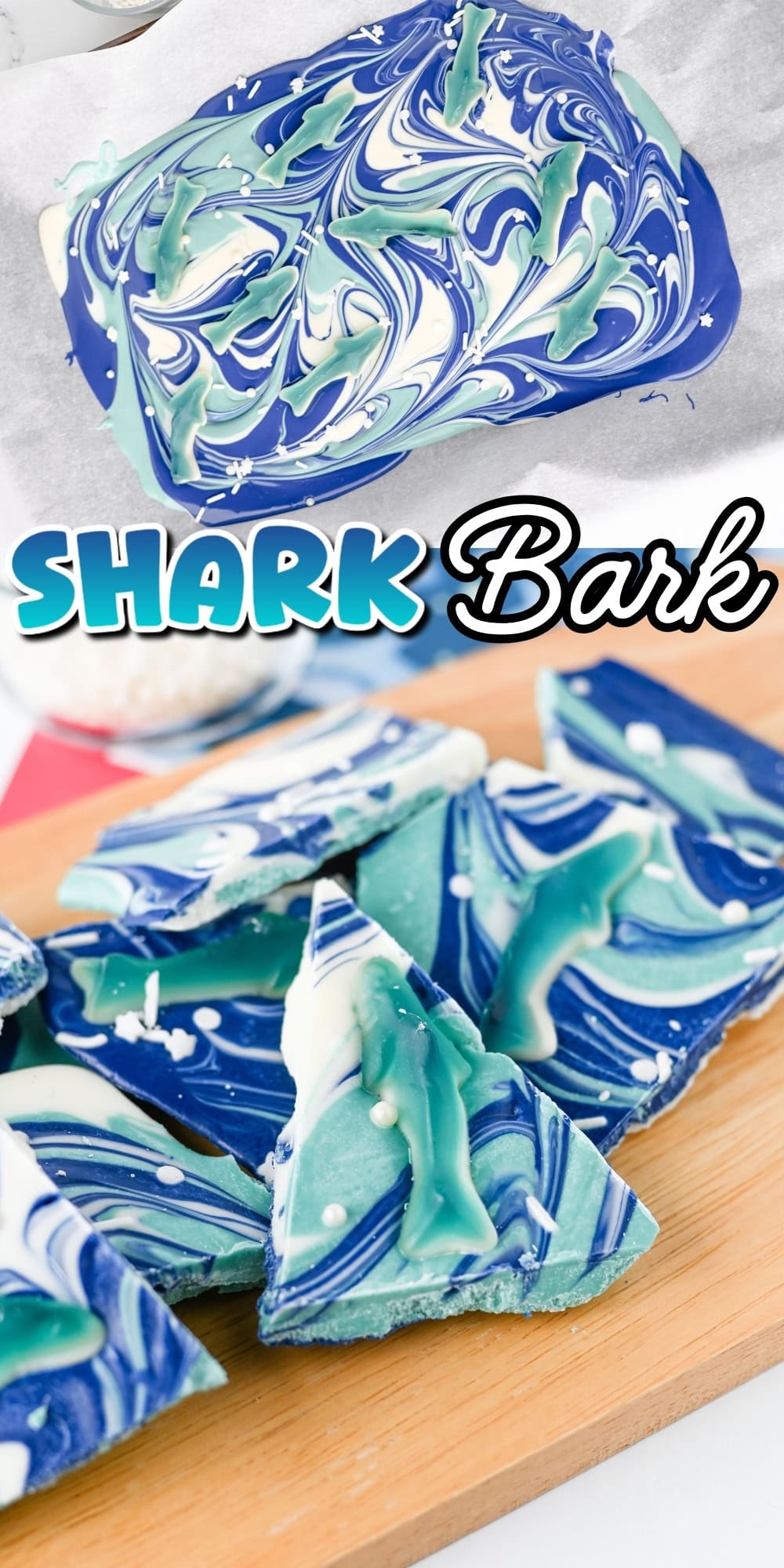 Blue and white swirled chocolate bark with gummy sharks on a wooden board.