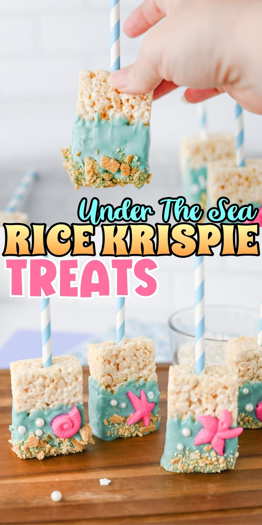 Rice Krispie treats dipped in blue coating, decorated with ocean-themed candies.