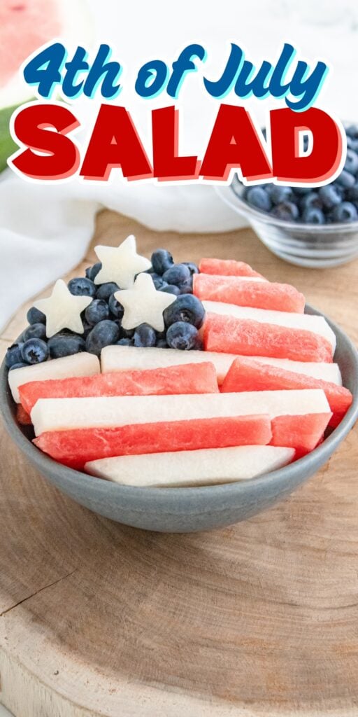 Bowl of fruit salad arranged as an American flag with watermelon and blueberries.