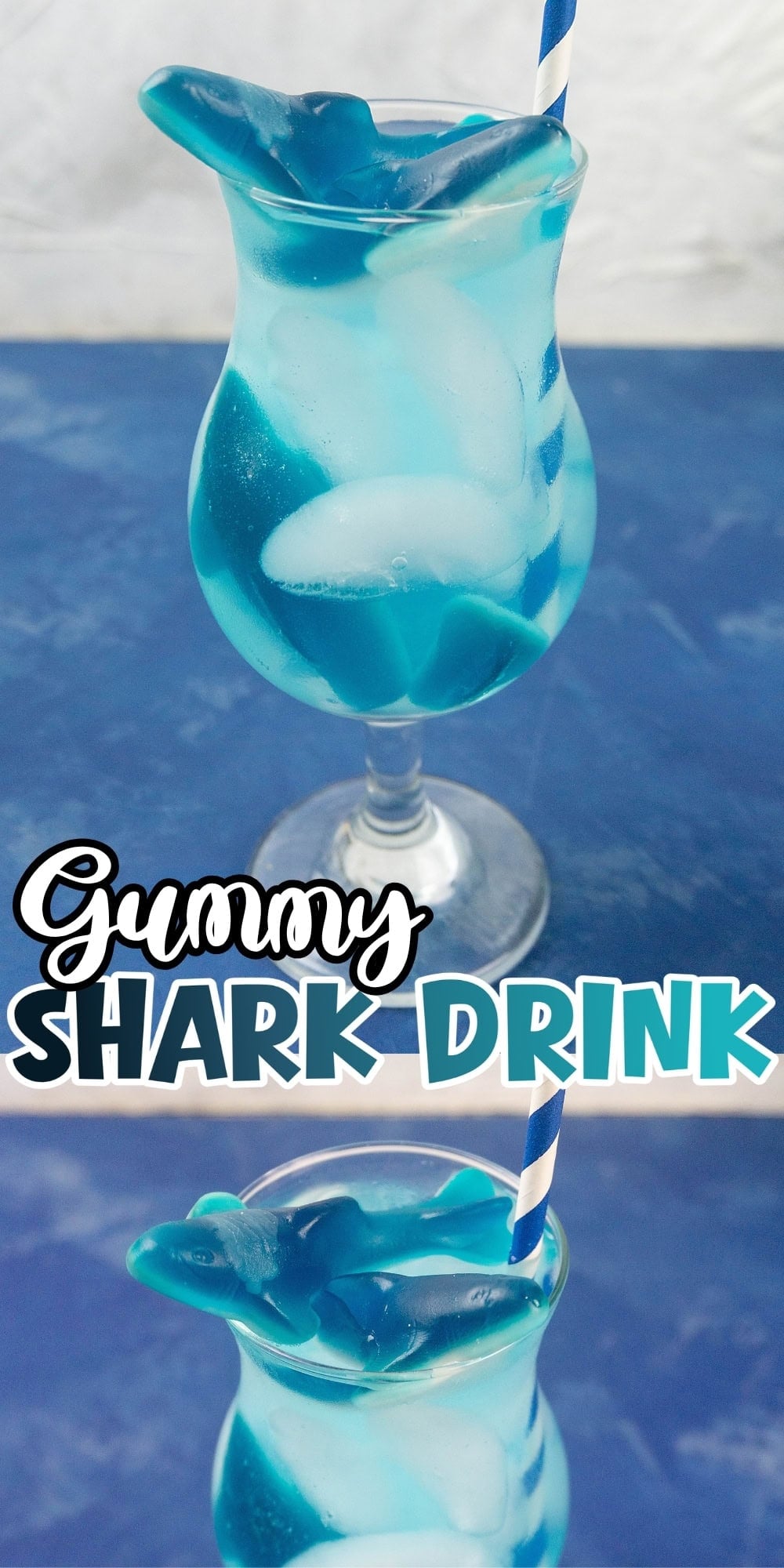 A blue drink with ice, gummy sharks, and a striped straw in a glass.