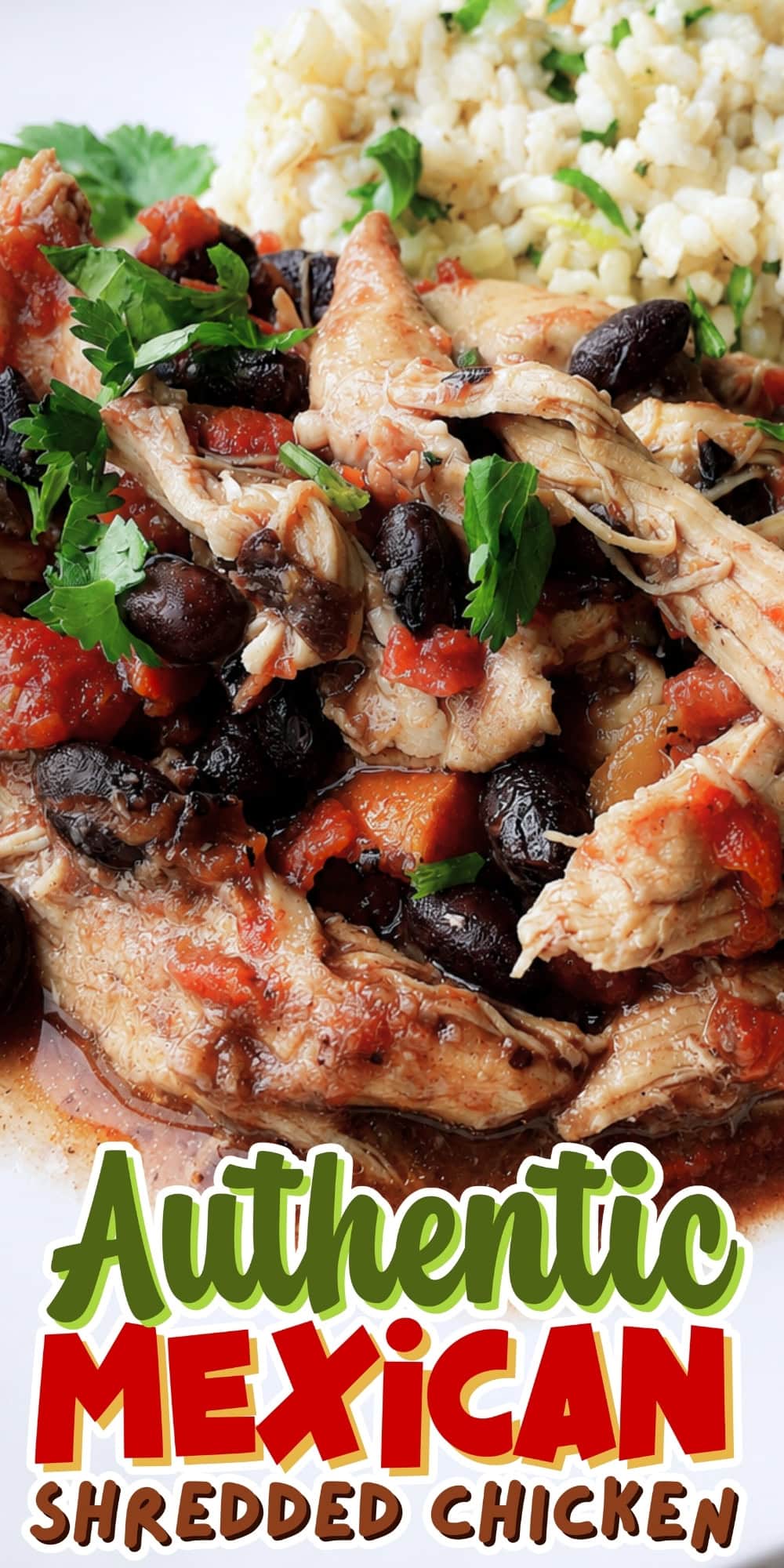 Shredded Mexican chicken with olives, tomatoes, and rice on a plate.