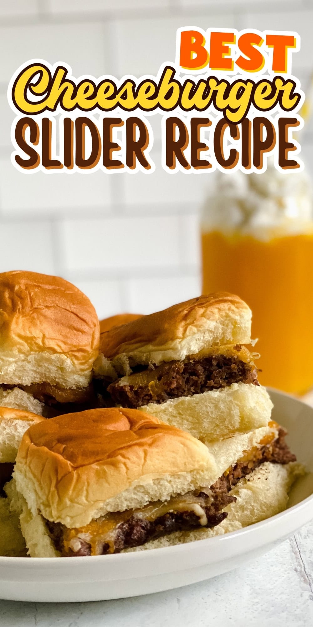 Plate of cheeseburger sliders with a drink in the background.