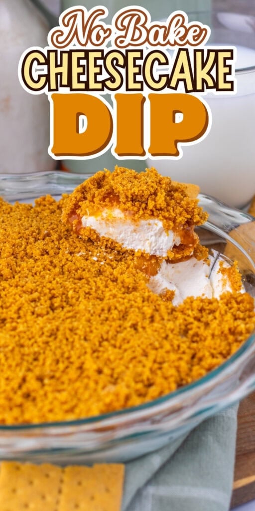 A glass dish of no bake cheesecake dip topped with crumbled cookies.