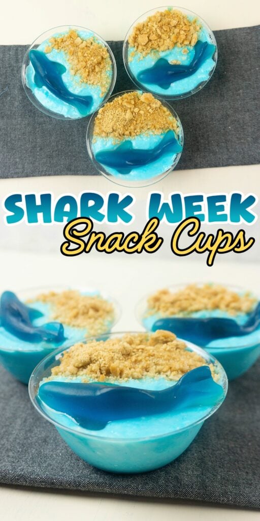 Three blue pudding cups topped with crushed cookies and gummy sharks.