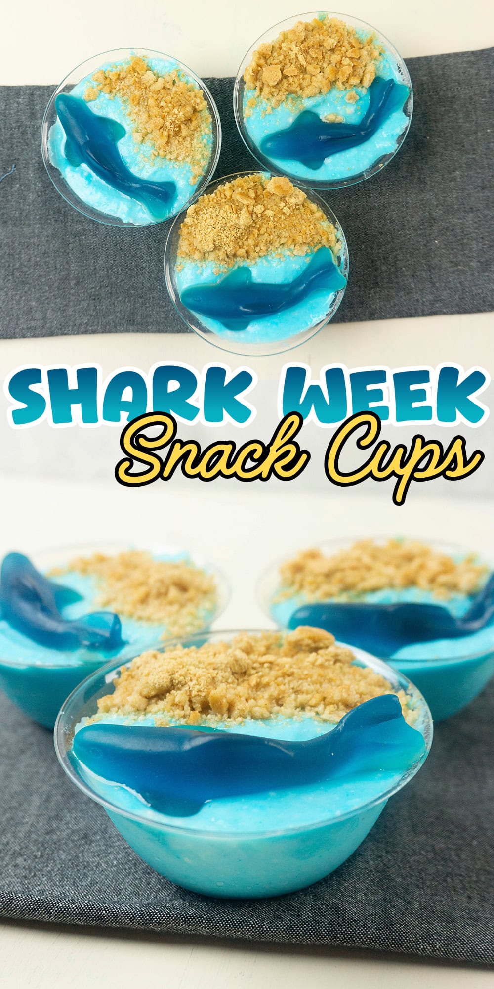 Three blue pudding cups topped with crushed cookies and gummy sharks.