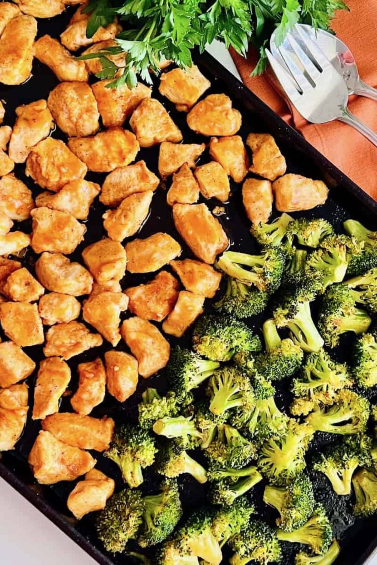 Baked chicken and broccoli—a classic in easy sheet pan dinner recipes.