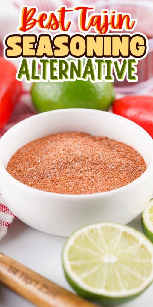 Bowl of homemade seasoning with limes and peppers.