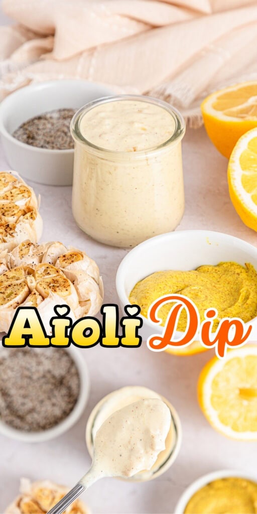 Jar of aioli dip surrounded by mustard, garlic, lemon halves, and spices.
