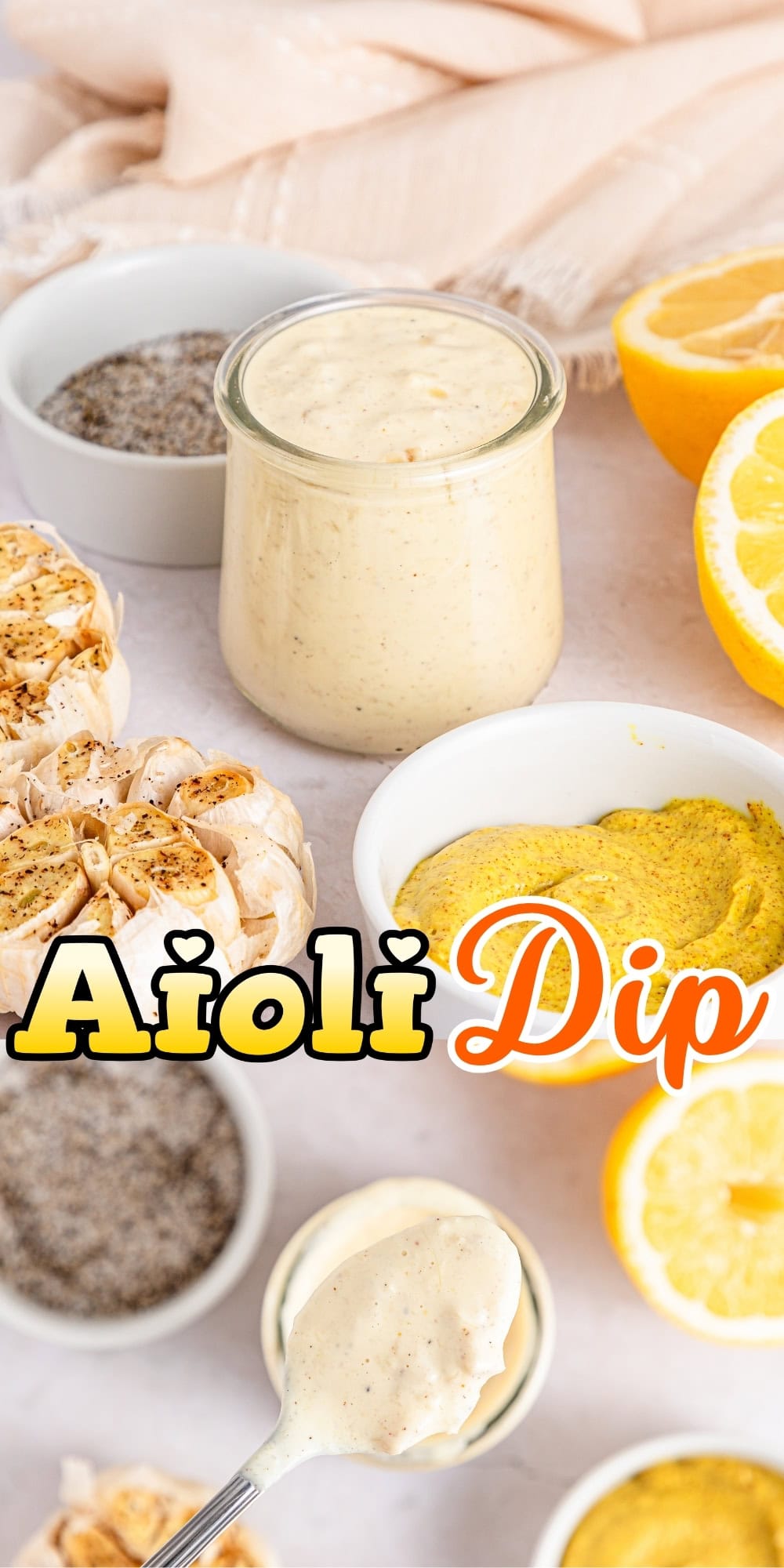Jar of aioli dip surrounded by mustard, garlic, lemon halves, and spices.