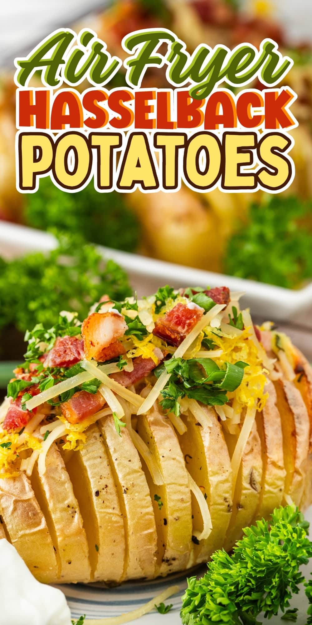 Sliced hasselback potato topped with cheese, bacon, and parsley.