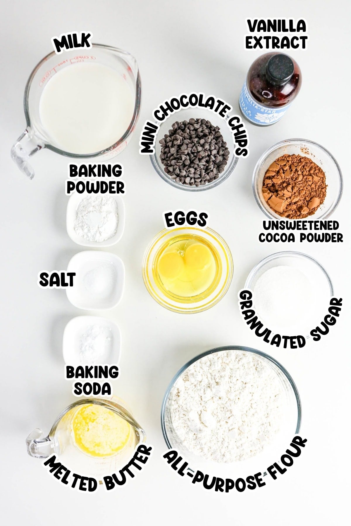 Baking ingredients labeled and arranged on a white background.