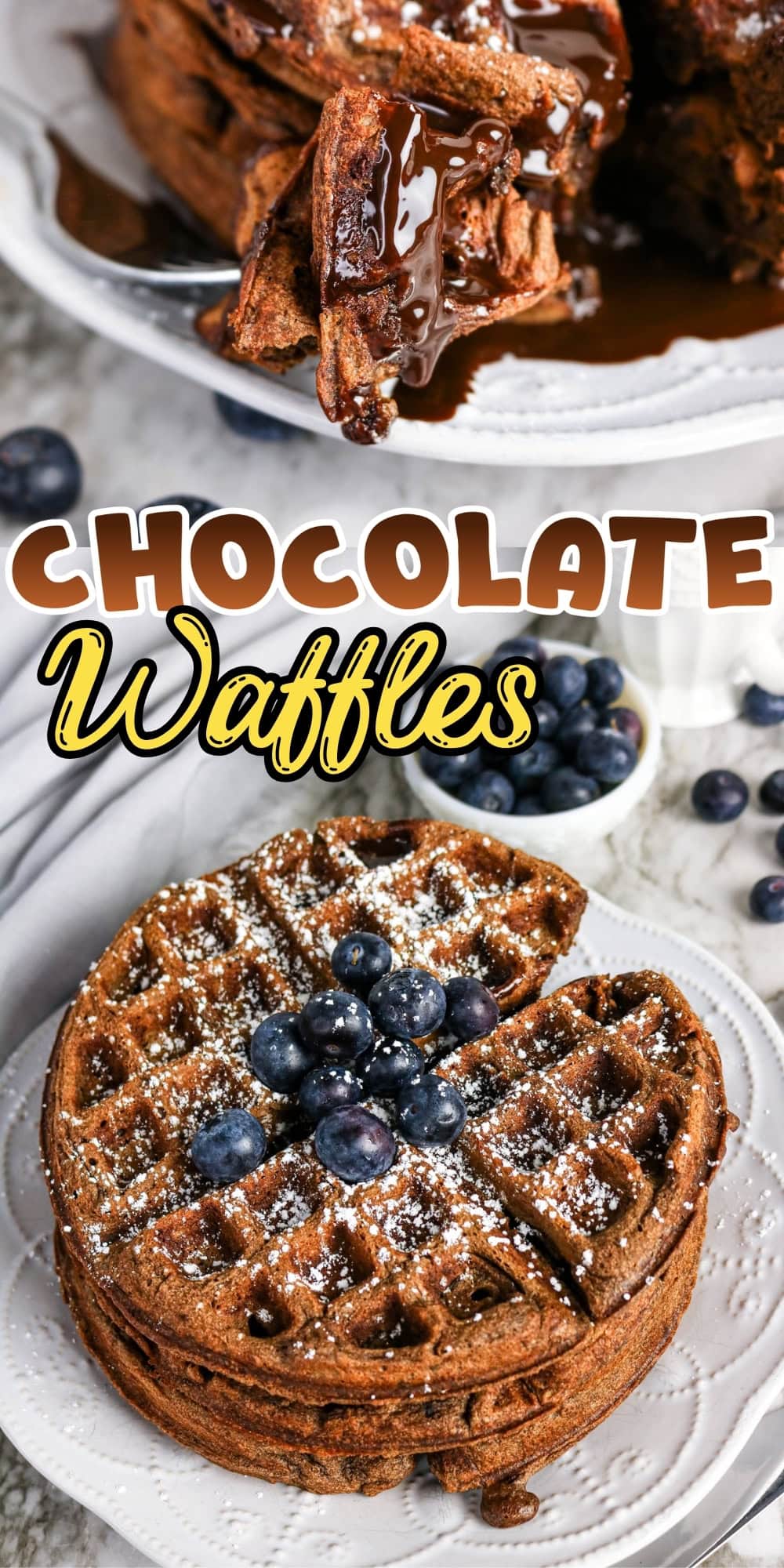 Chocolate waffles topped with blueberries and powdered sugar on a white plate.