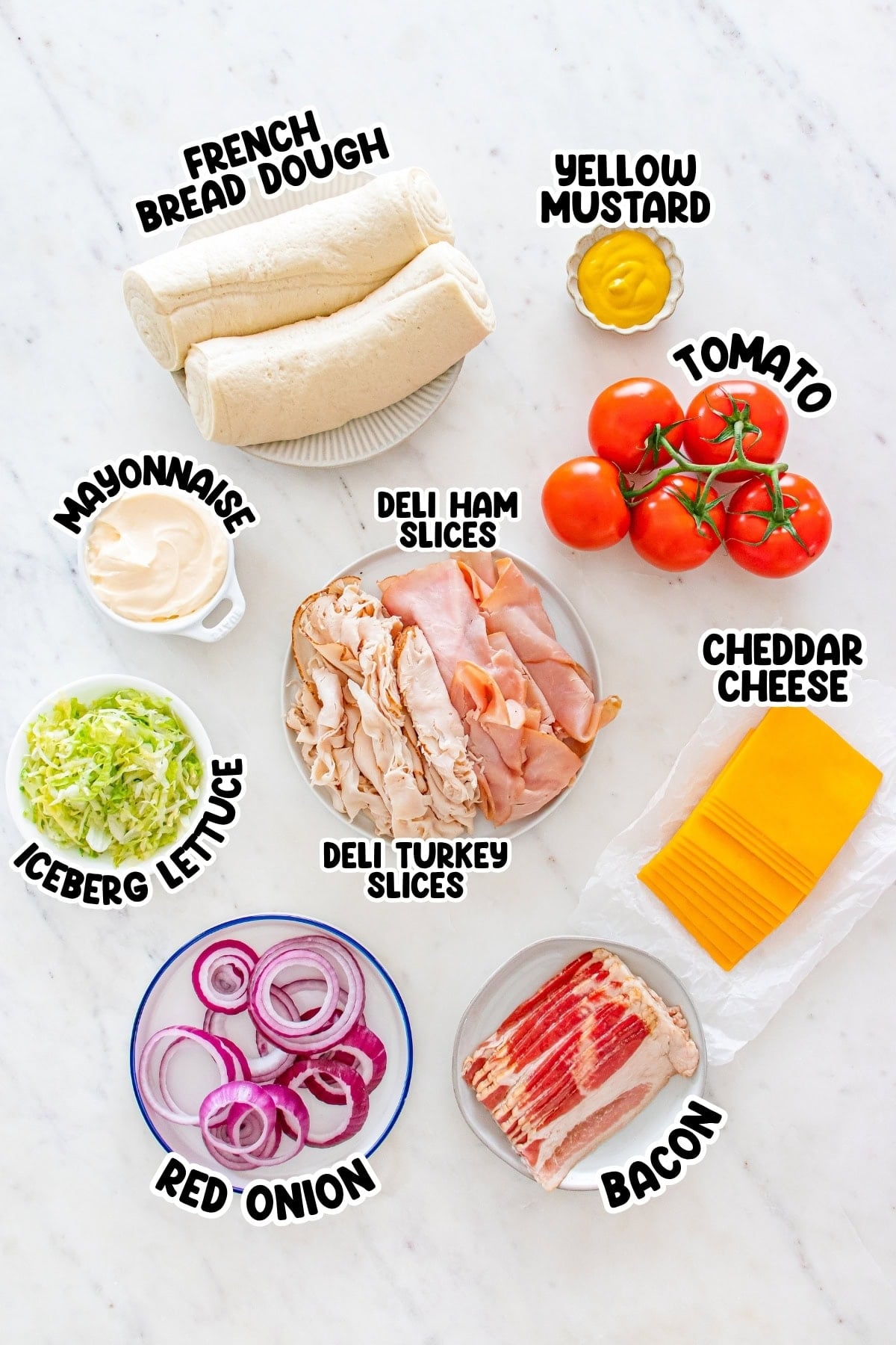 Sandwich ingredients: bread dough, meats, cheese, bacon, veggies, condiments.