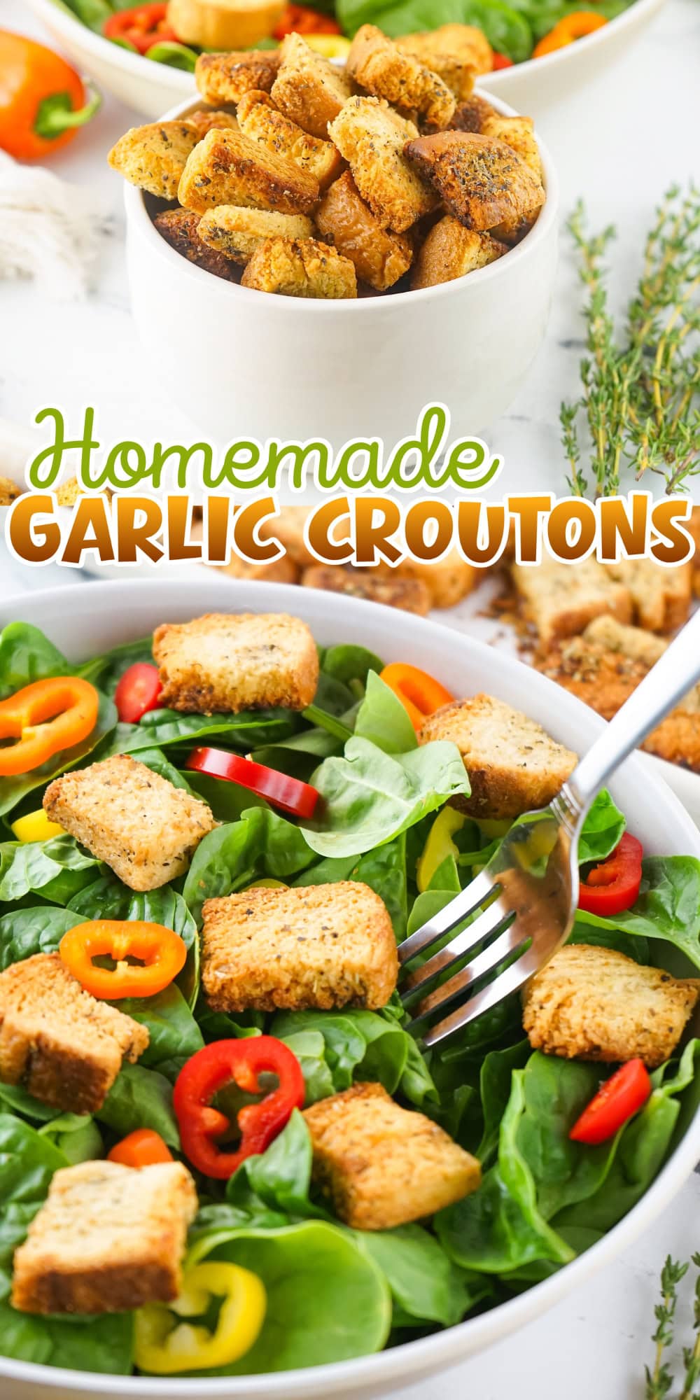 Bowl of salad with garlic croutons and sliced mini peppers on top.