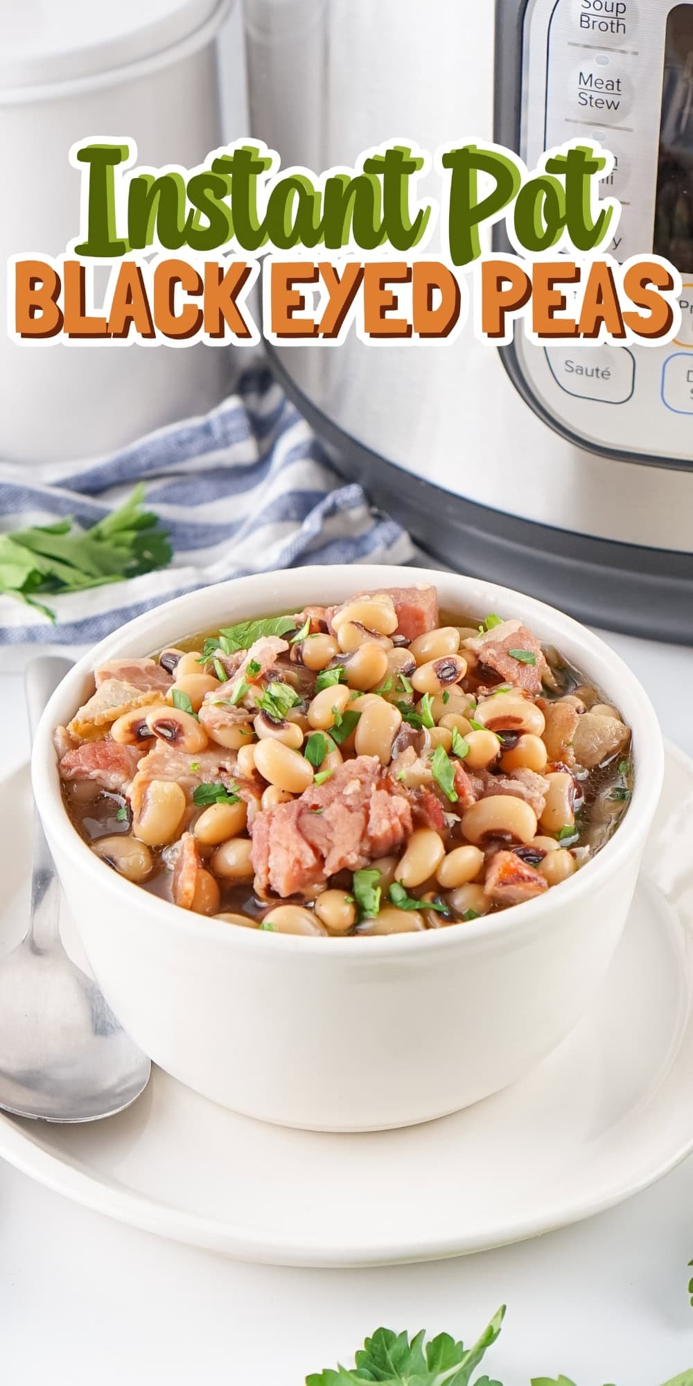 Bowl of black-eyed peas with ham next to an Instant Pot on a table.
