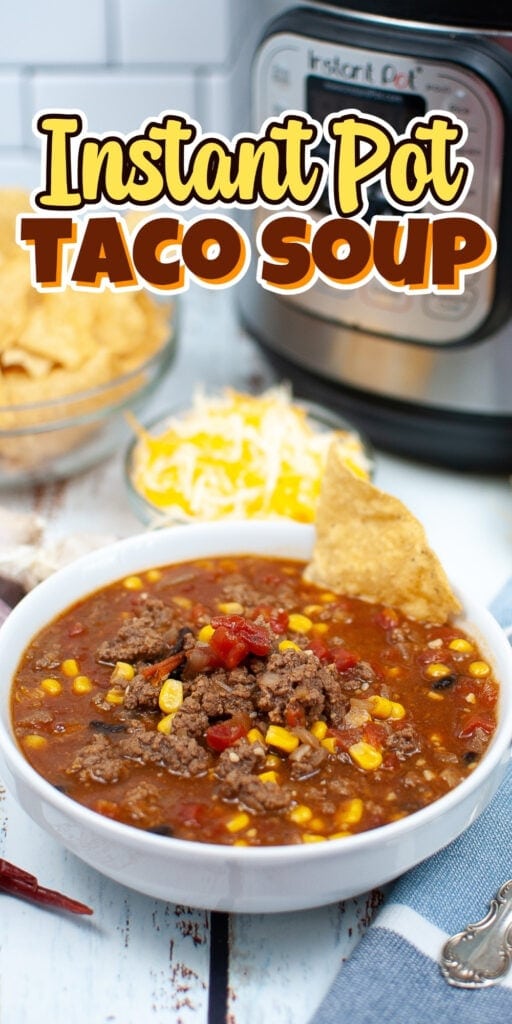 Bowl of taco soup with chips, cheese, and an Instant Pot in the background.