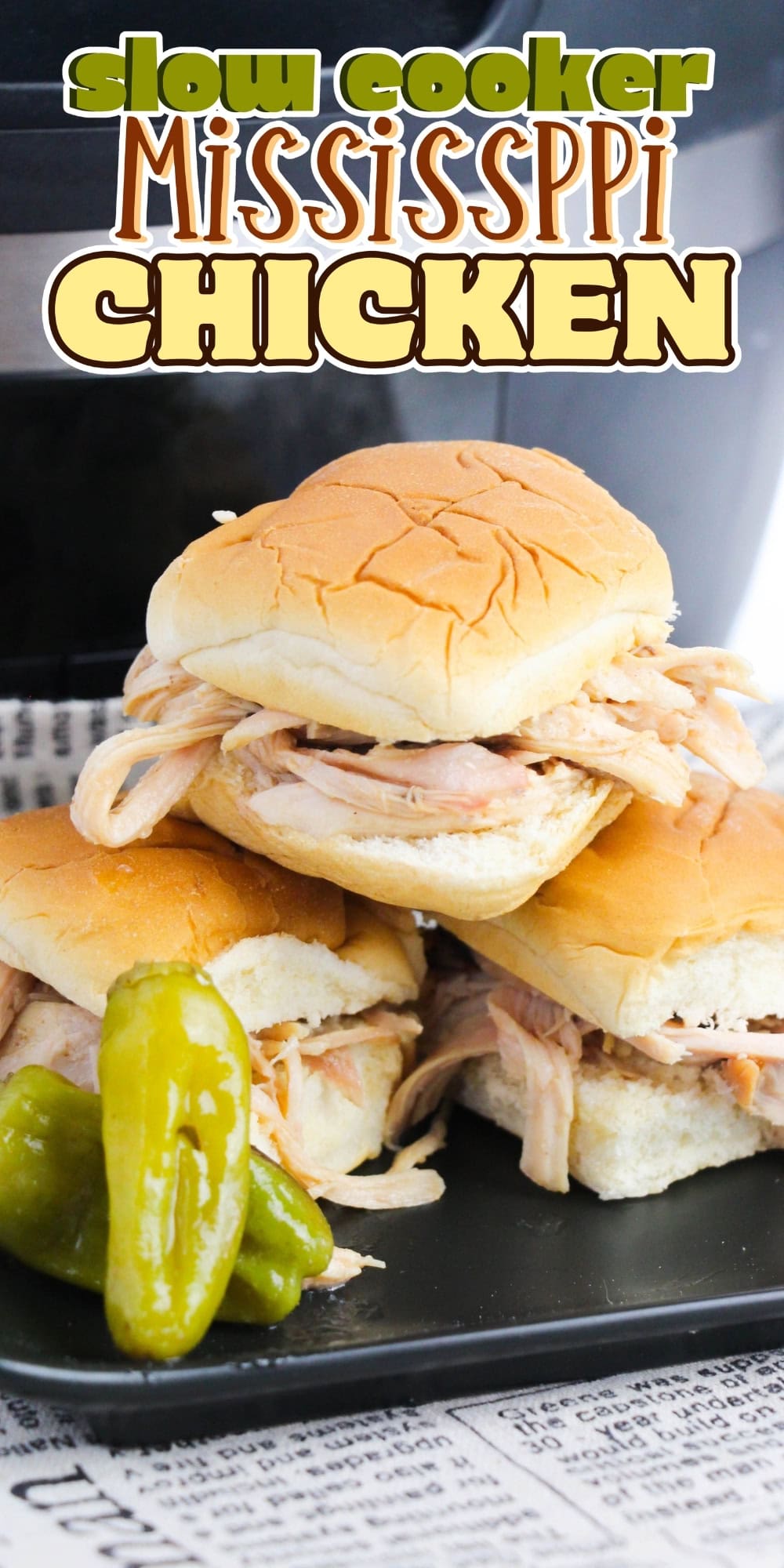 Slow Cooker Mississippi Chicken: Shredded chicken sandwiches with peppers.
