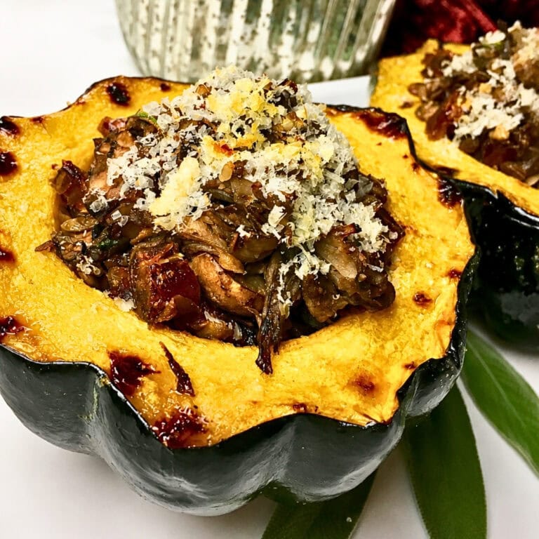Stuffed acorn squash filled with savory ingredients.