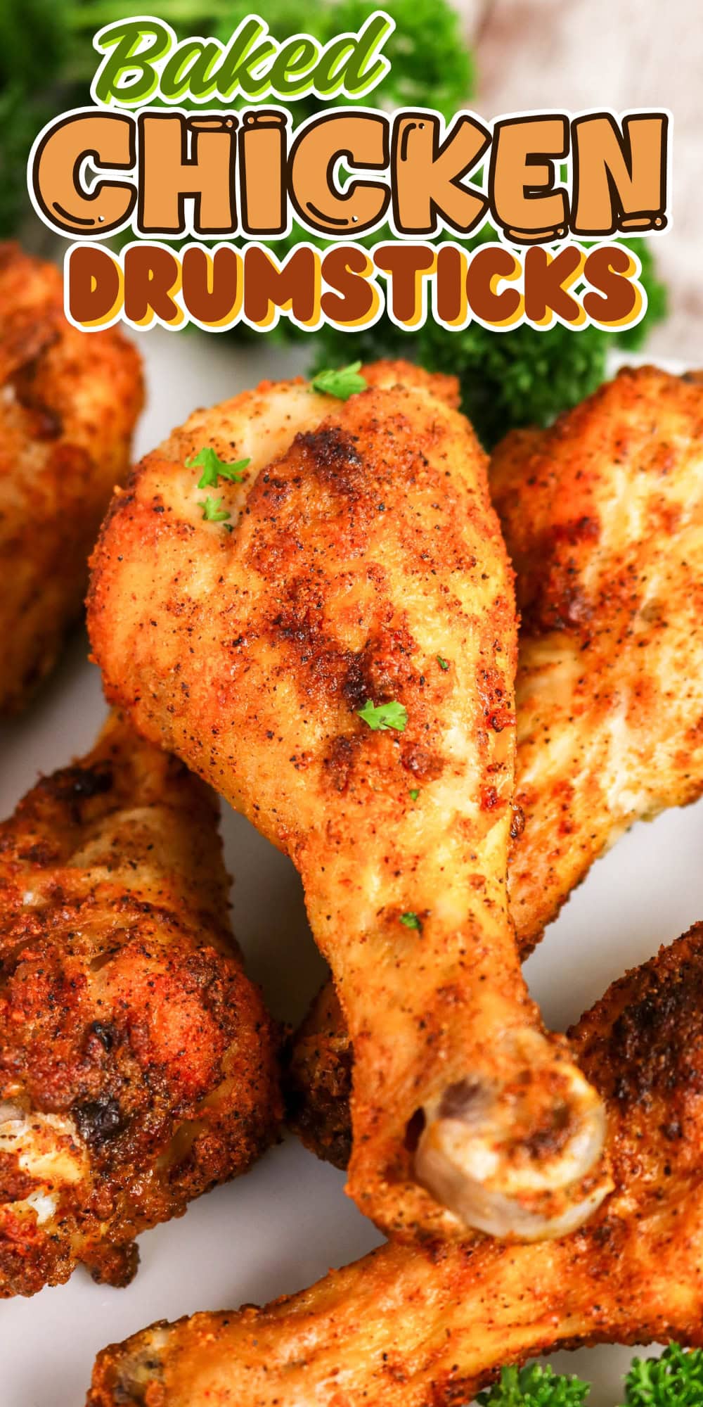 Baked chicken drumsticks on a plate, garnished with parsley.