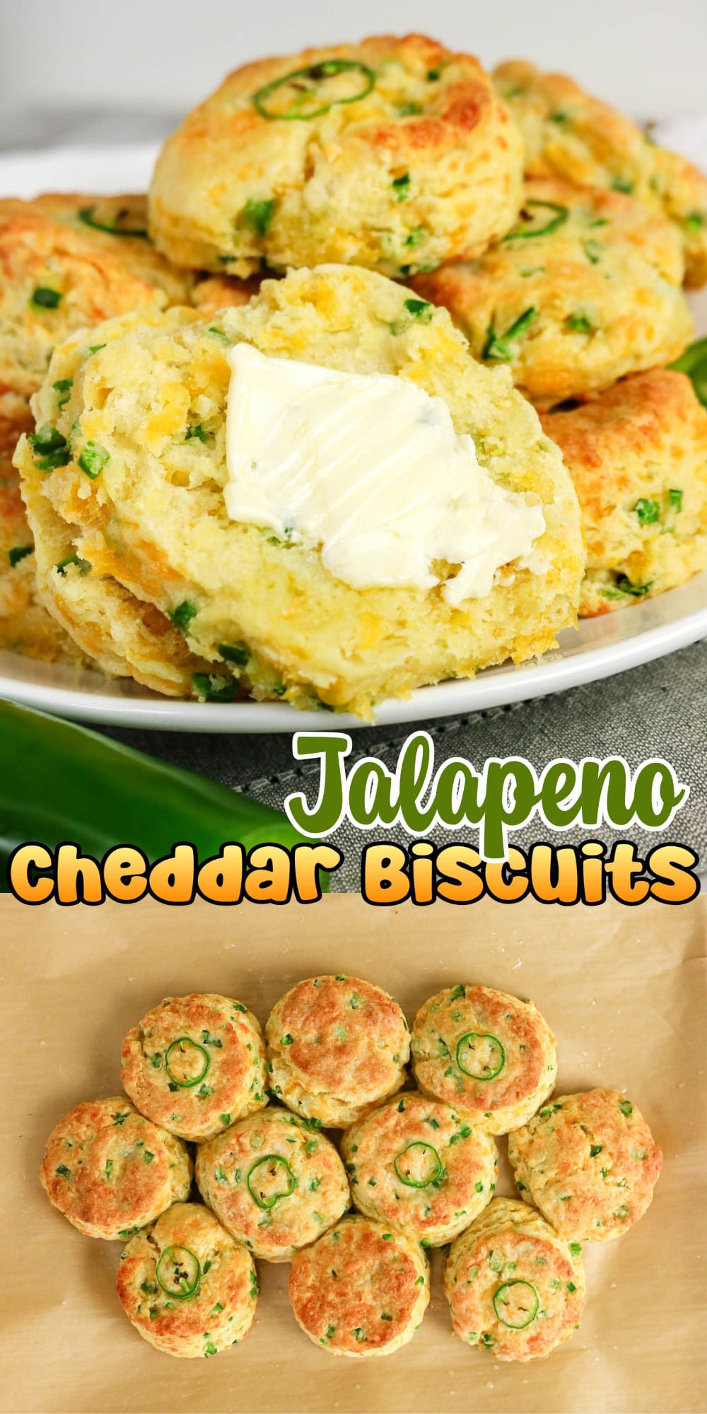 Cheddar jalapeno biscuits, one split with butter, others on a baking sheet.