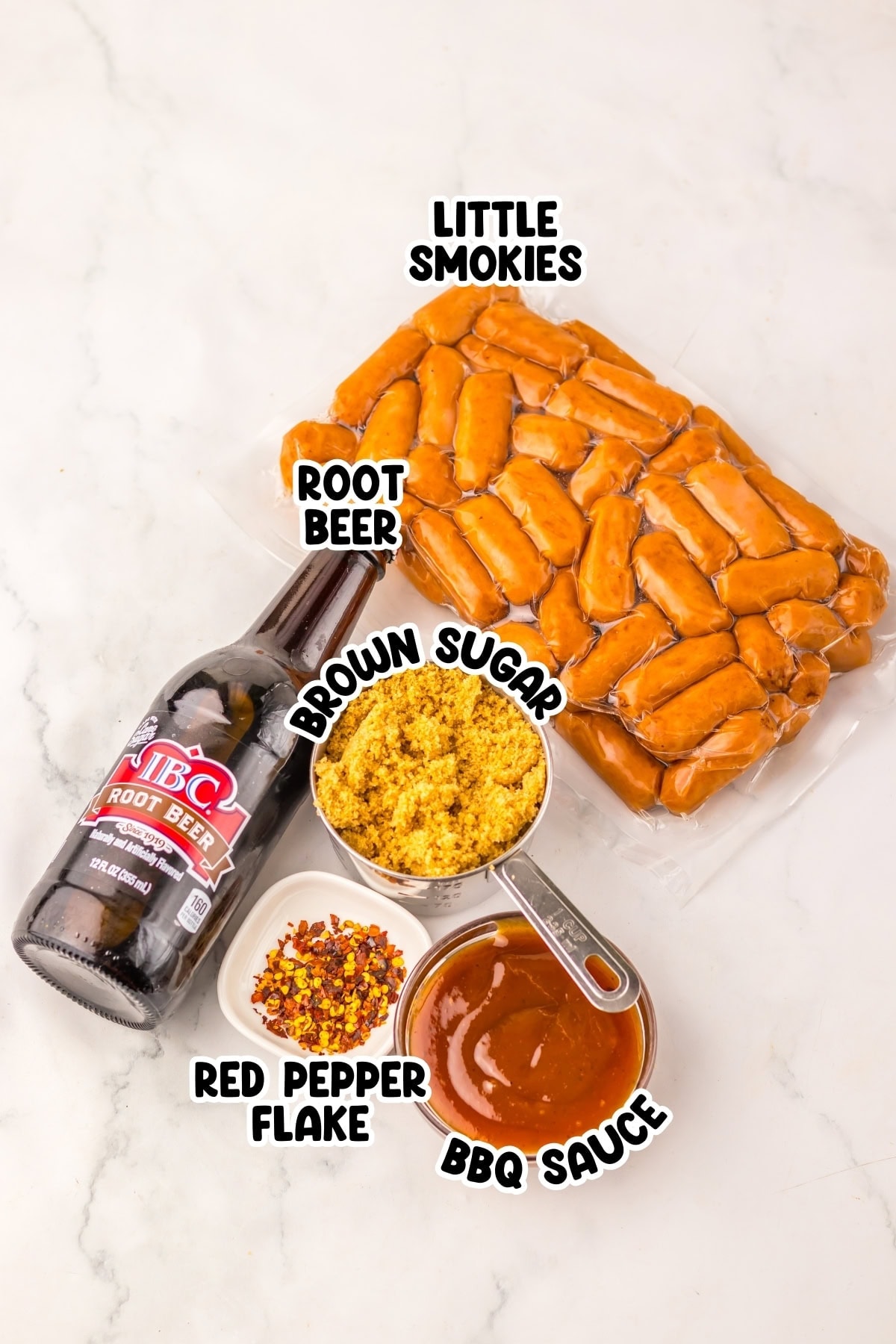 Little smokies, root beer, brown sugar, BBQ sauce, and red pepper flakes.