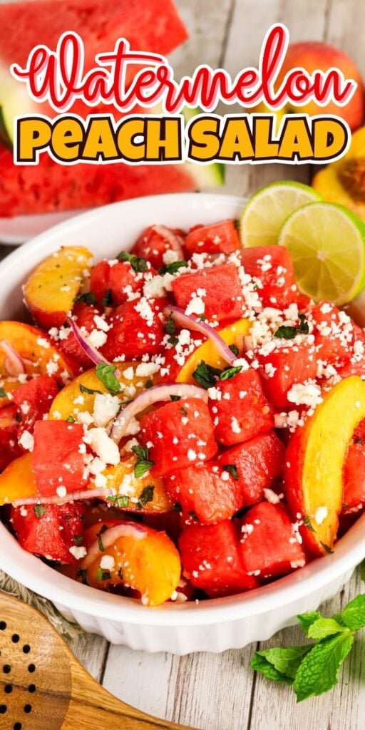 Bowl of watermelon peach salad topped with feta, mint, and lime slices.