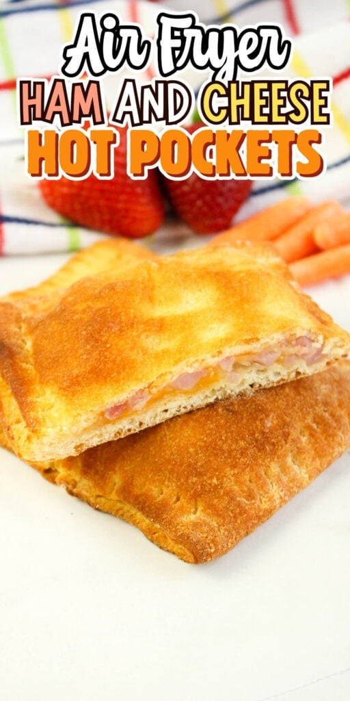 Two golden brown ham and cheese hot pockets on a white surface.