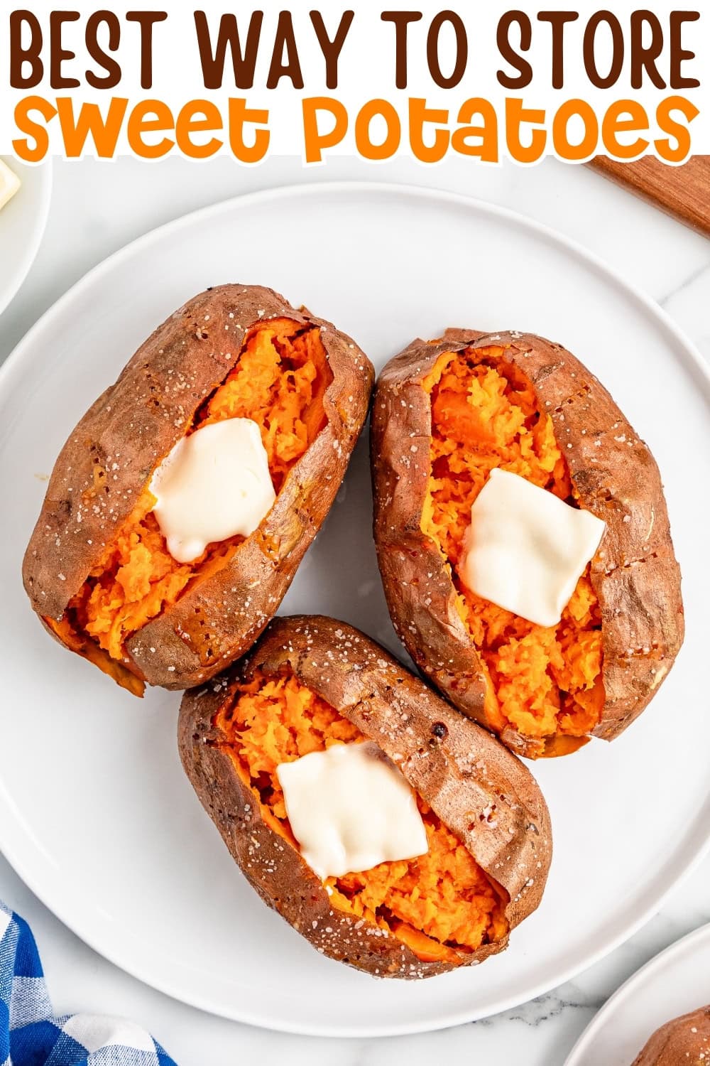 Three baked sweet potatoes with butter on a white plate.