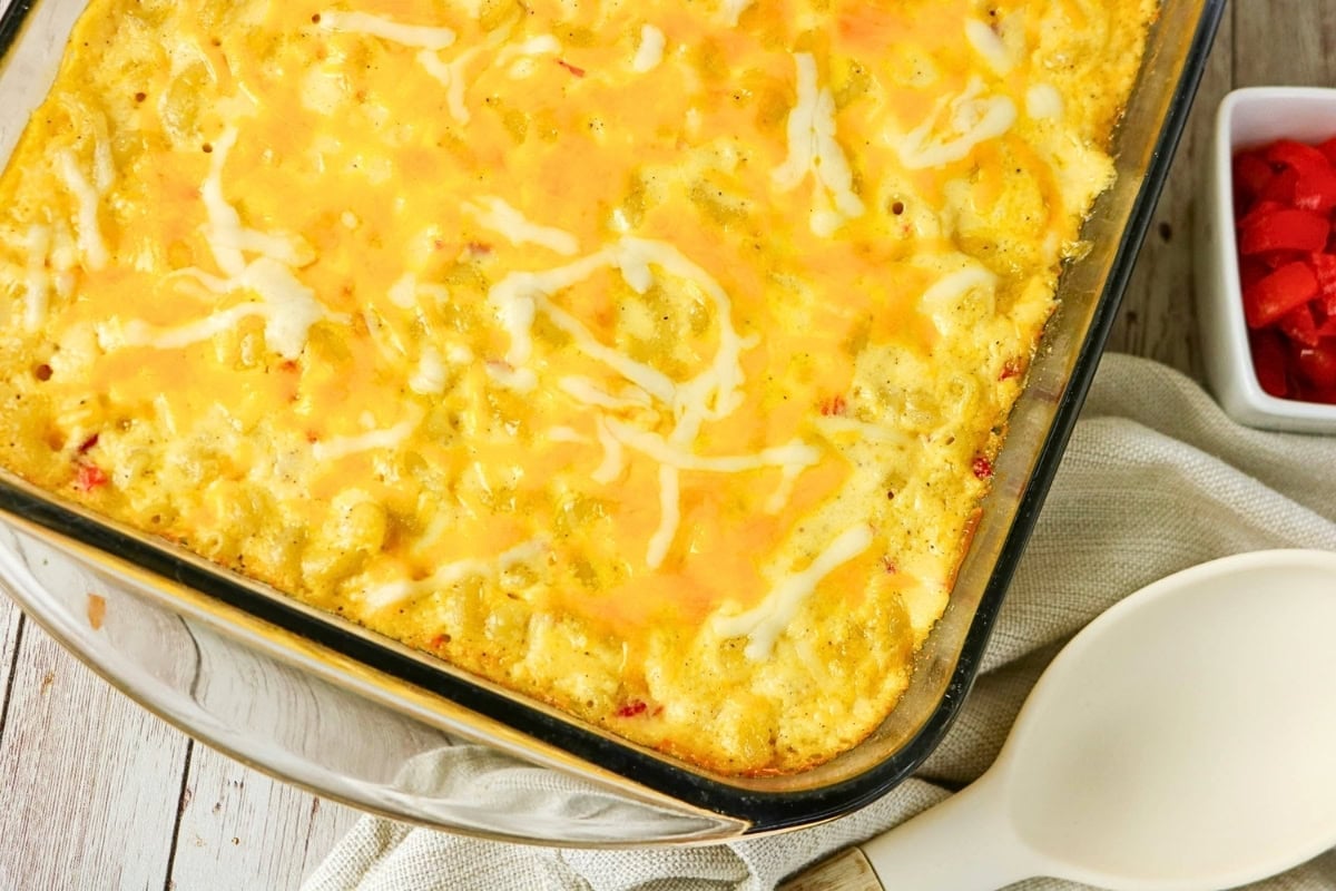 Cheesy casserole in a glass dish.