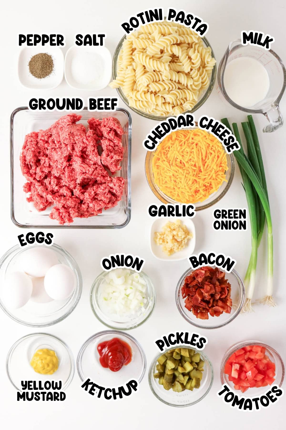 Rotini, beef, cheddar, milk, eggs, bacon, onion, garlic, pickles, tomato, ketchup.