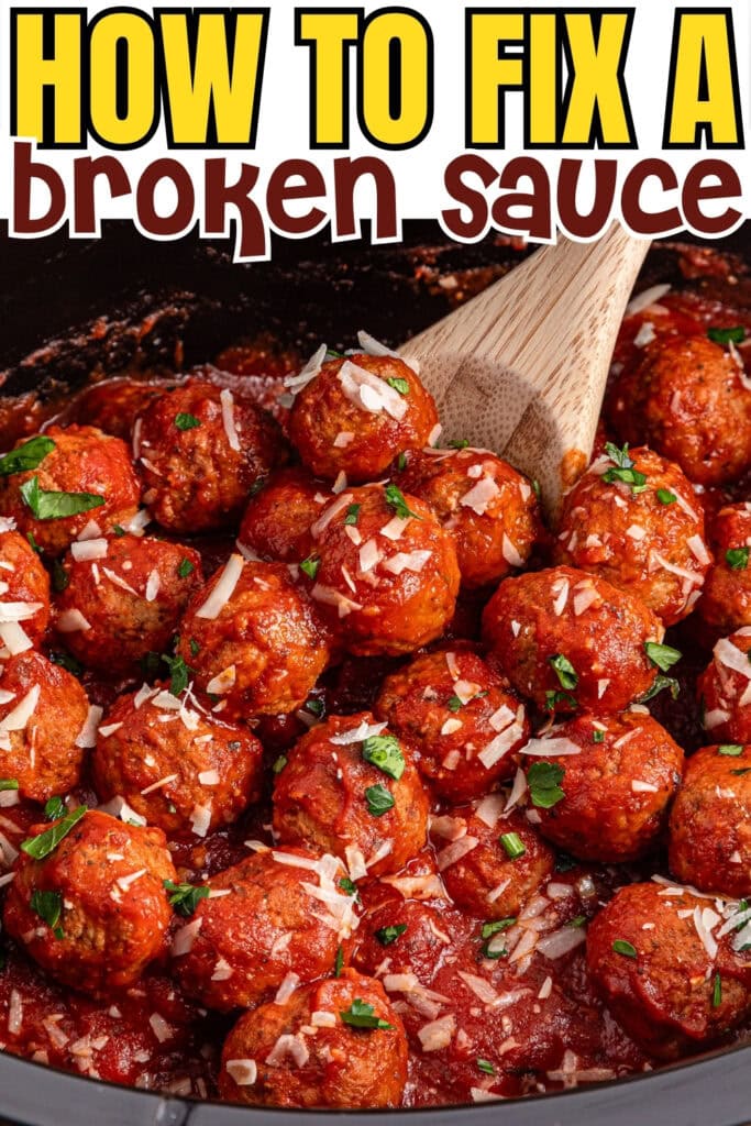 Meatballs in tomato sauce with herbs and cheese, stirred with a wooden spoon.