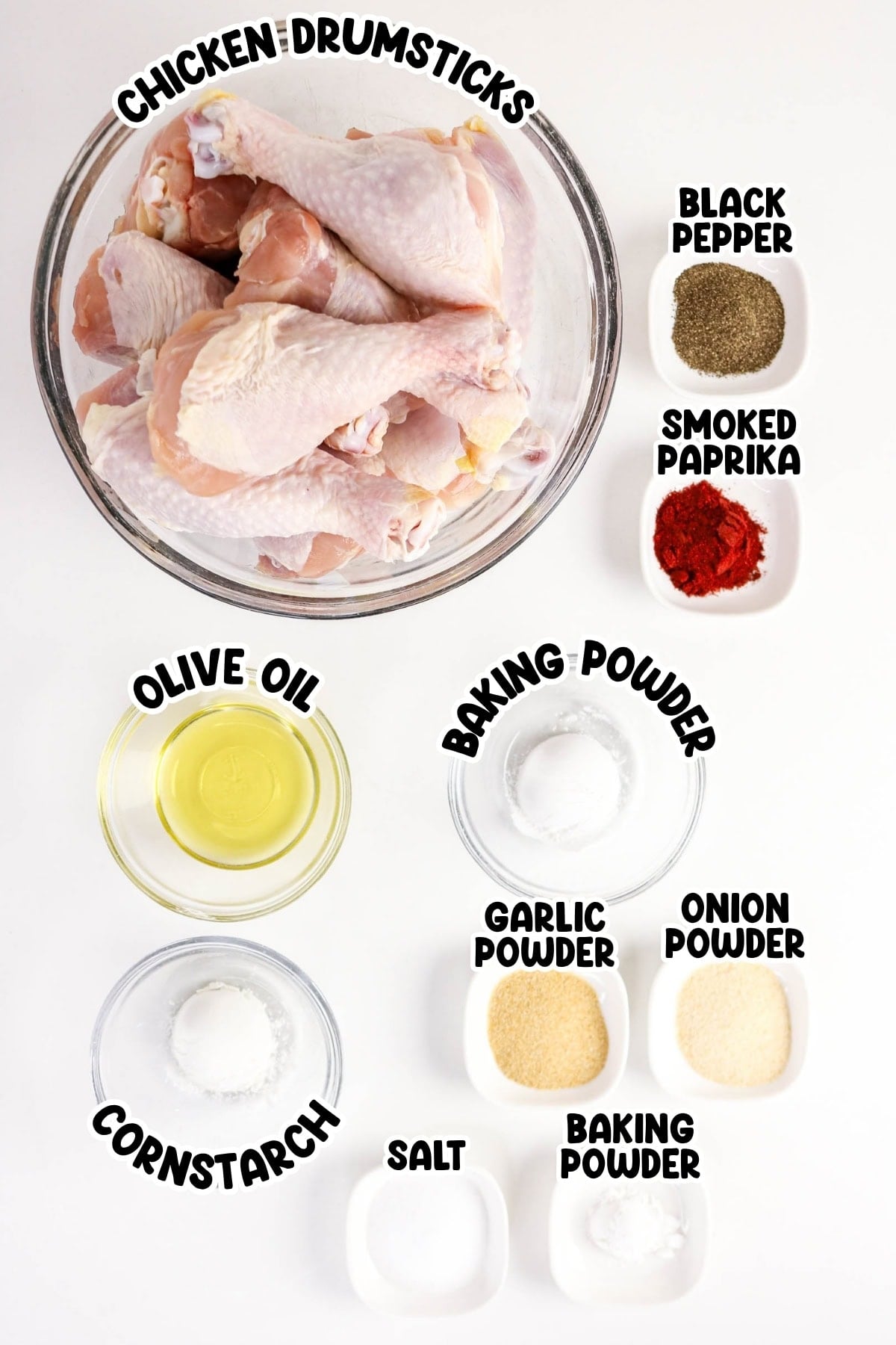 Chicken drumsticks, olive oil, cornstarch, salt, pepper, paprika, garlic, onion, baking powder.