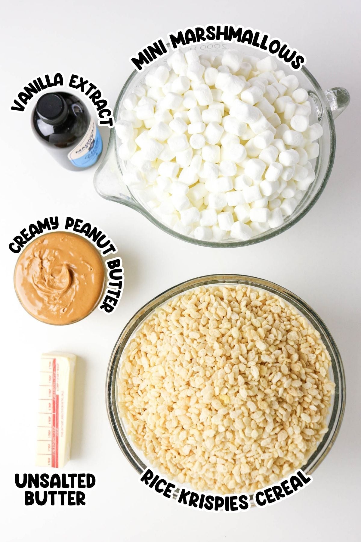 Bowls of marshmallows, peanut butter, cereal, plus butter and vanilla extract.