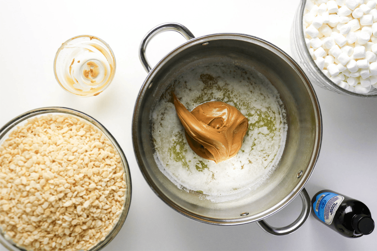 Melt butter, add peanut butter, mix in marshmallows and cereal, stir to combine.