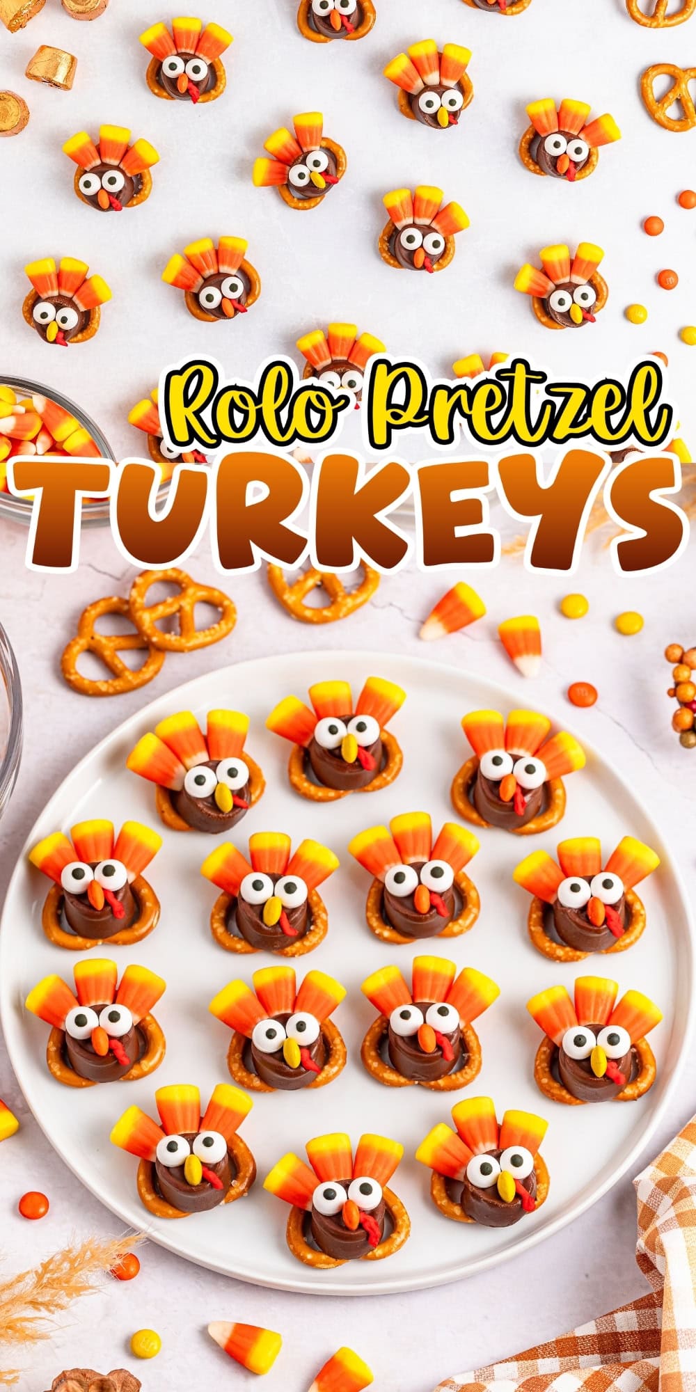 Rolo pretzel turkey treats with candy corn and candy eyes on a plate and table.
