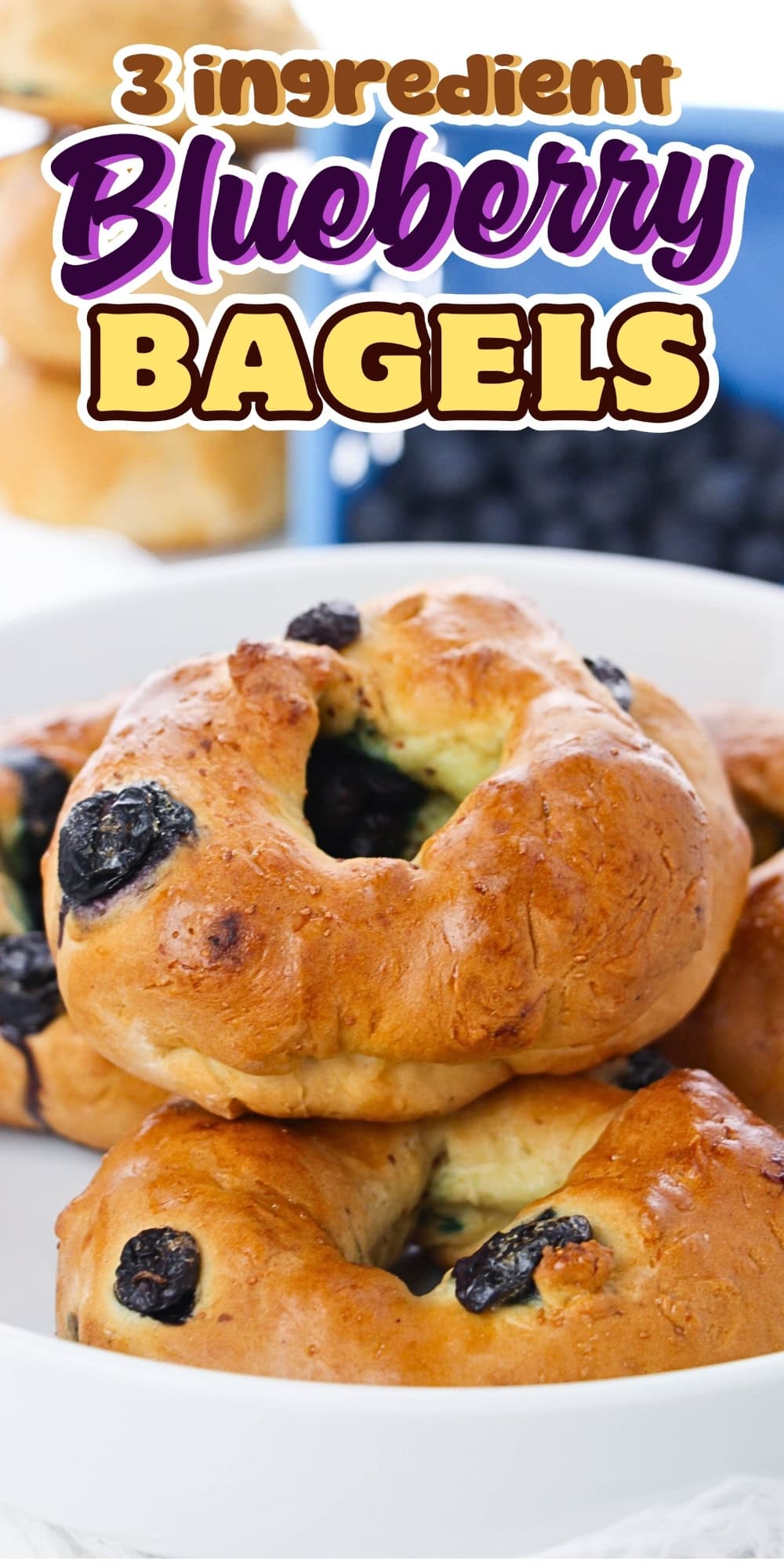 Stack of blueberry bagels on a white plate.