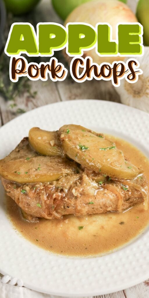 A plate of pork chops topped with apple slices and sauce.