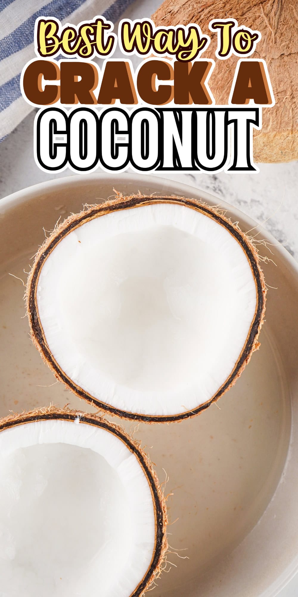 Two coconut halves in a bowl.