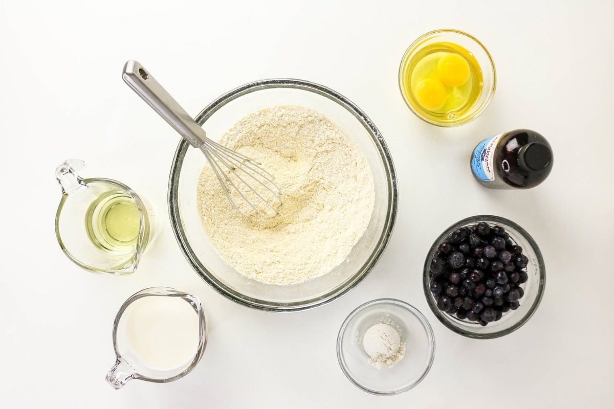Ingredients: flour, eggs, oil, milk, vanilla, blueberries, and salt.